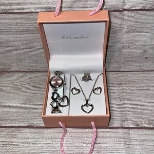 Heart shaped Watch, necklace, earrings,ring with pink accent by Luis Cardini